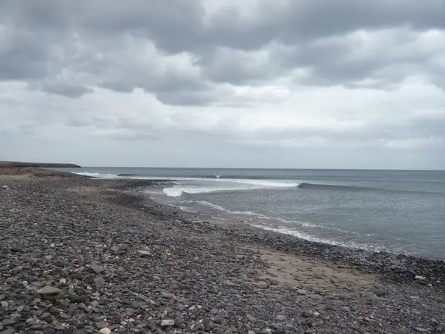 Playa El Rancho beach in Fuerteventura with wavy water conditions