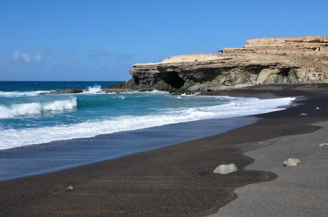 Playa de Ajuy beach in Fuerteventura with surfable water conditions
