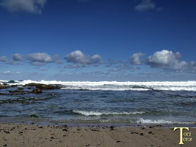 Playa Punta del Clavo beach in Gran Canaria with wavy water conditions