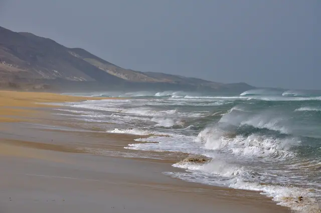 Playa de Cofete beach in Fuerteventura with surfable water conditions
