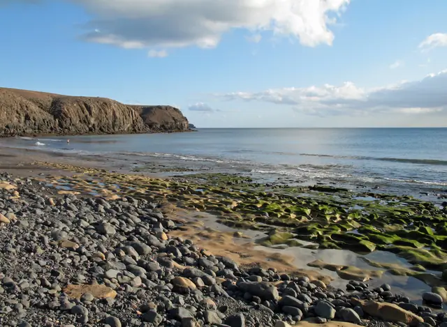 Playa de las Coloradas beach in Lanzarote with calm water conditions