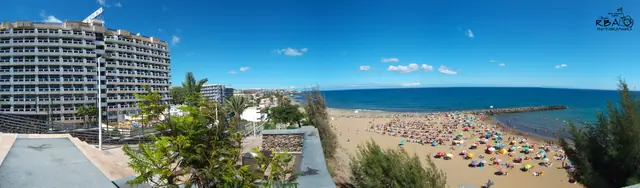 Playas del Veril beach in Gran Canaria, featuring a sandy shoreline with moderate water conditions