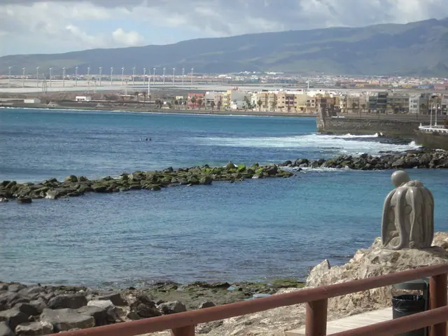 Playa de Arinaga beach in Gran Canaria with moderate water conditions
