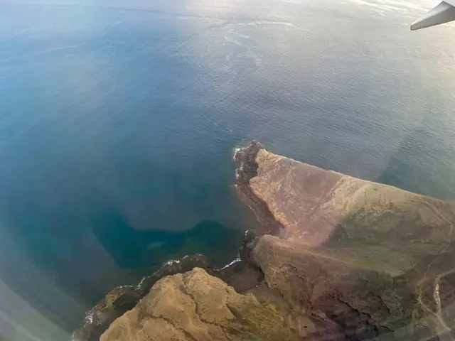 Playa Cuevas del Trigo beach in Tenerife, featuring a sandy shoreline with moderate water conditions